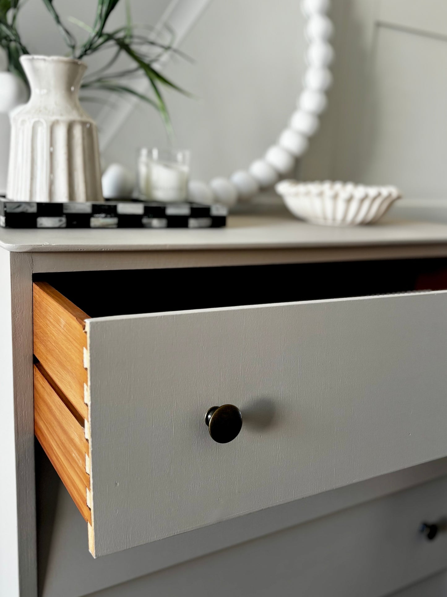 Neutral mid century tall chest of drawers. Upcycled vintage drawers. Neutral drawers with brass handles