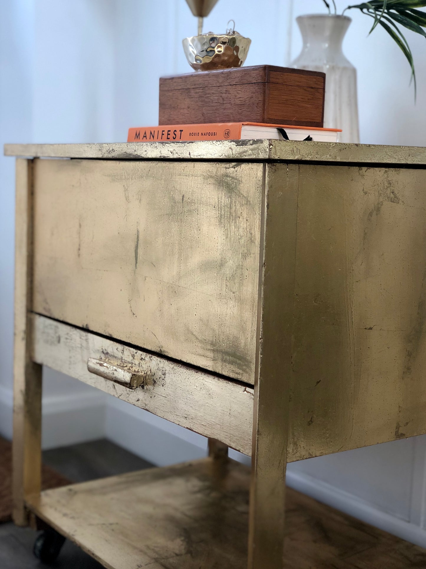 gold leaf furniture/gold leaf sewing box with fun colourful floral wallpaper inside