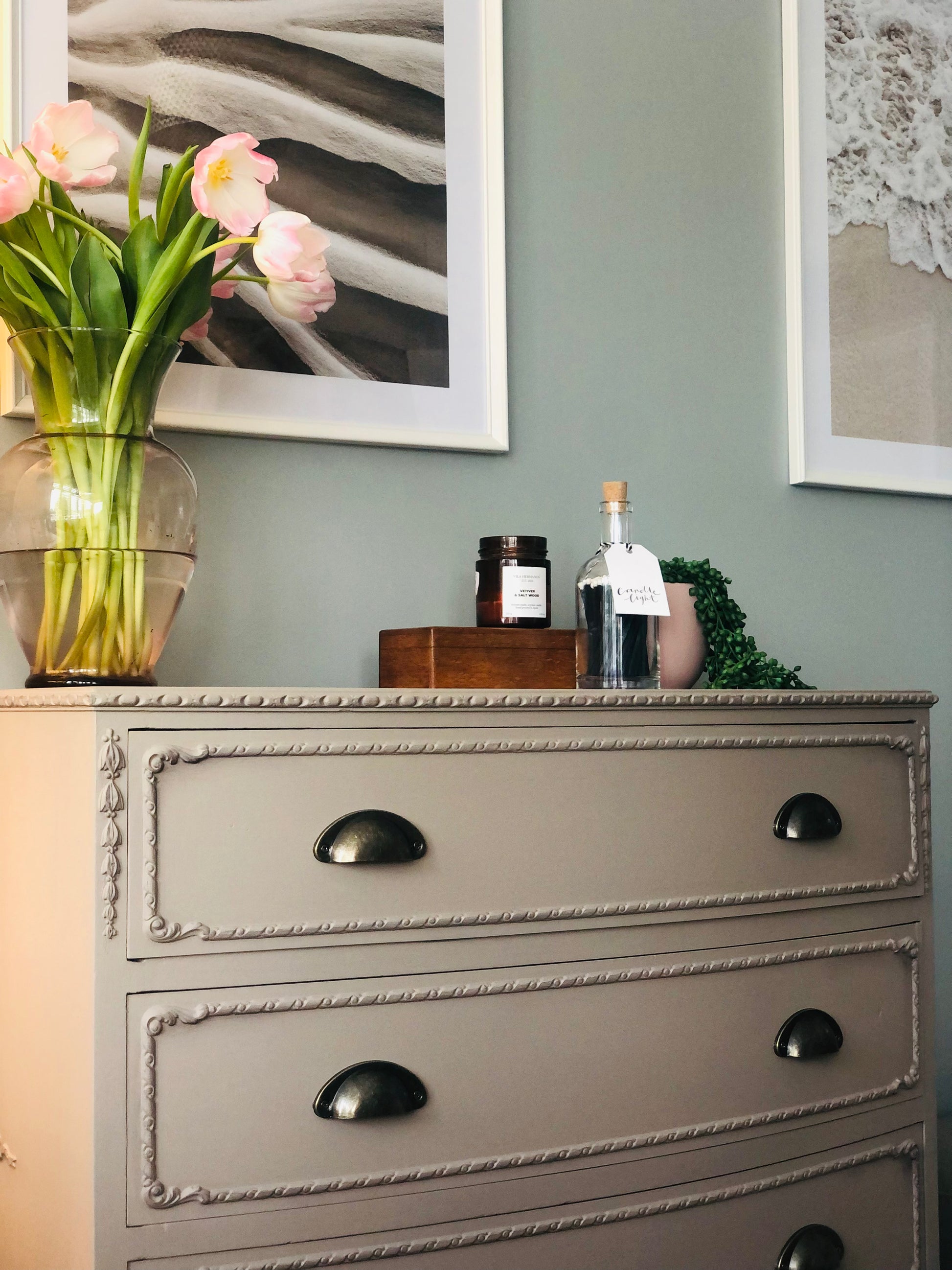 Queen Anne/French style neutral painted vintage chest of drawers with modern cup handles