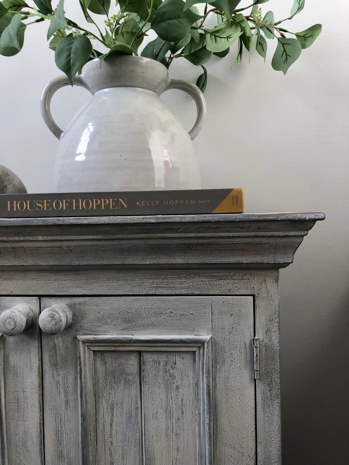 weathered and rustic vintage pine cabinet  