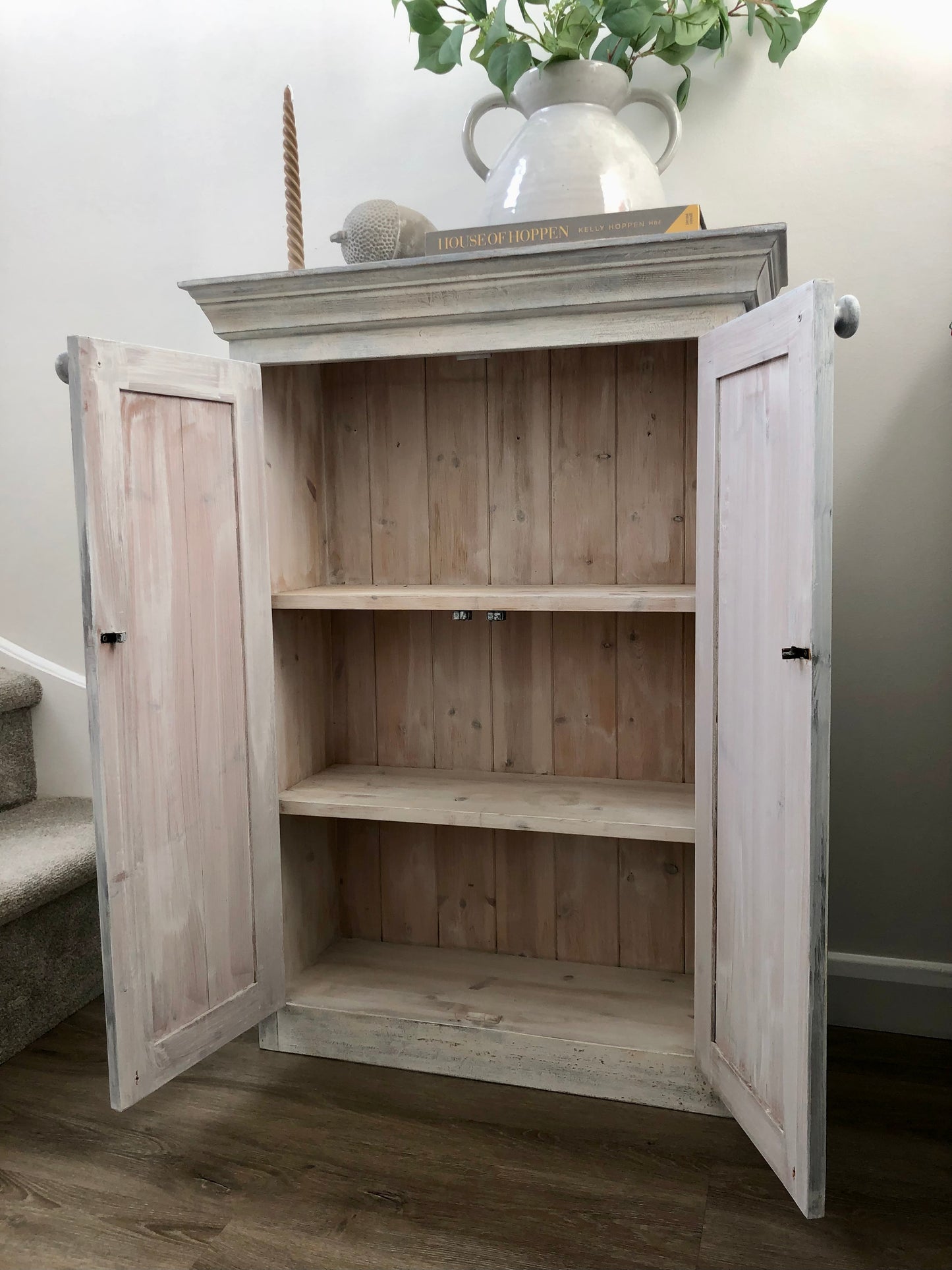 weathered and rustic vintage pine cabinet  