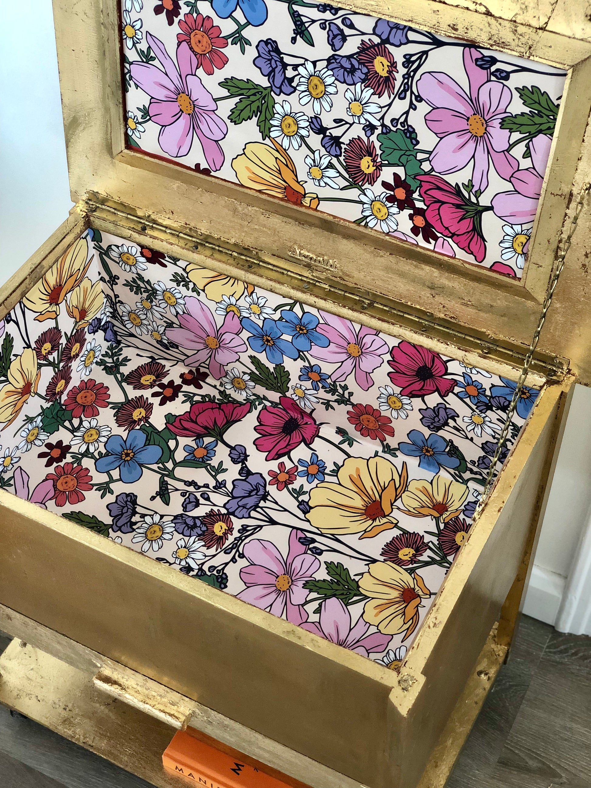 gold leaf furniture/gold leaf sewing box with fun colourful floral wallpaper inside 