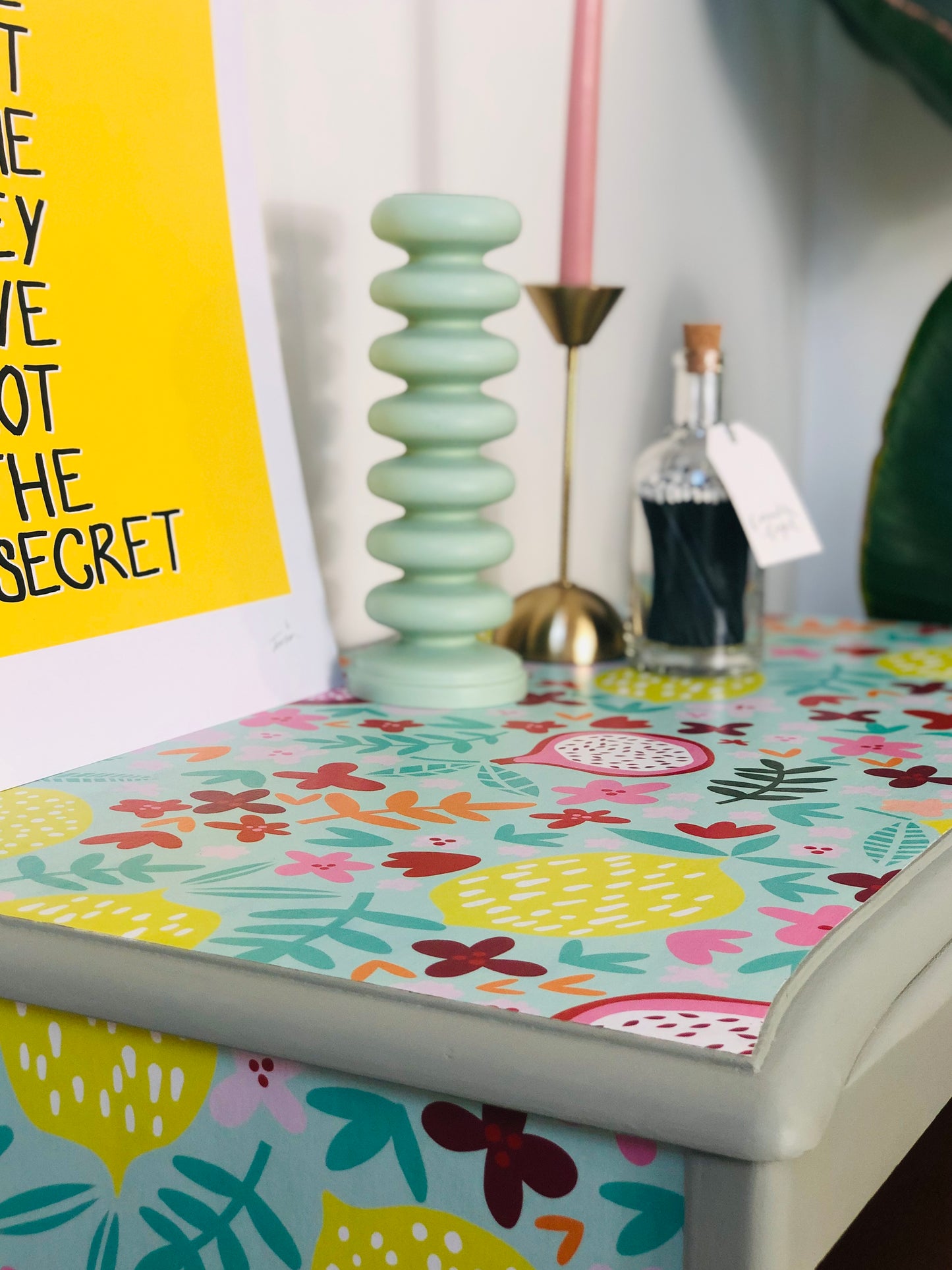 . Chest of Drawers, Painted Neutral Green, With Colourful Fruit And Floral Wallpaper Design