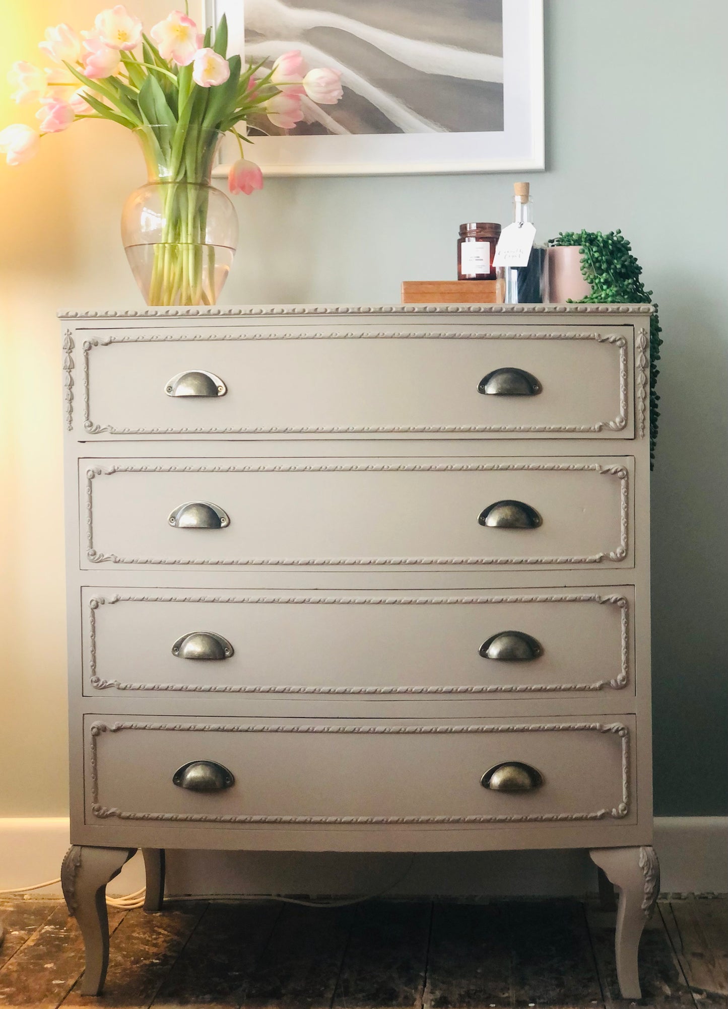 Queen Anne/French style neutral painted vintage chest of drawers with modern cup handles
