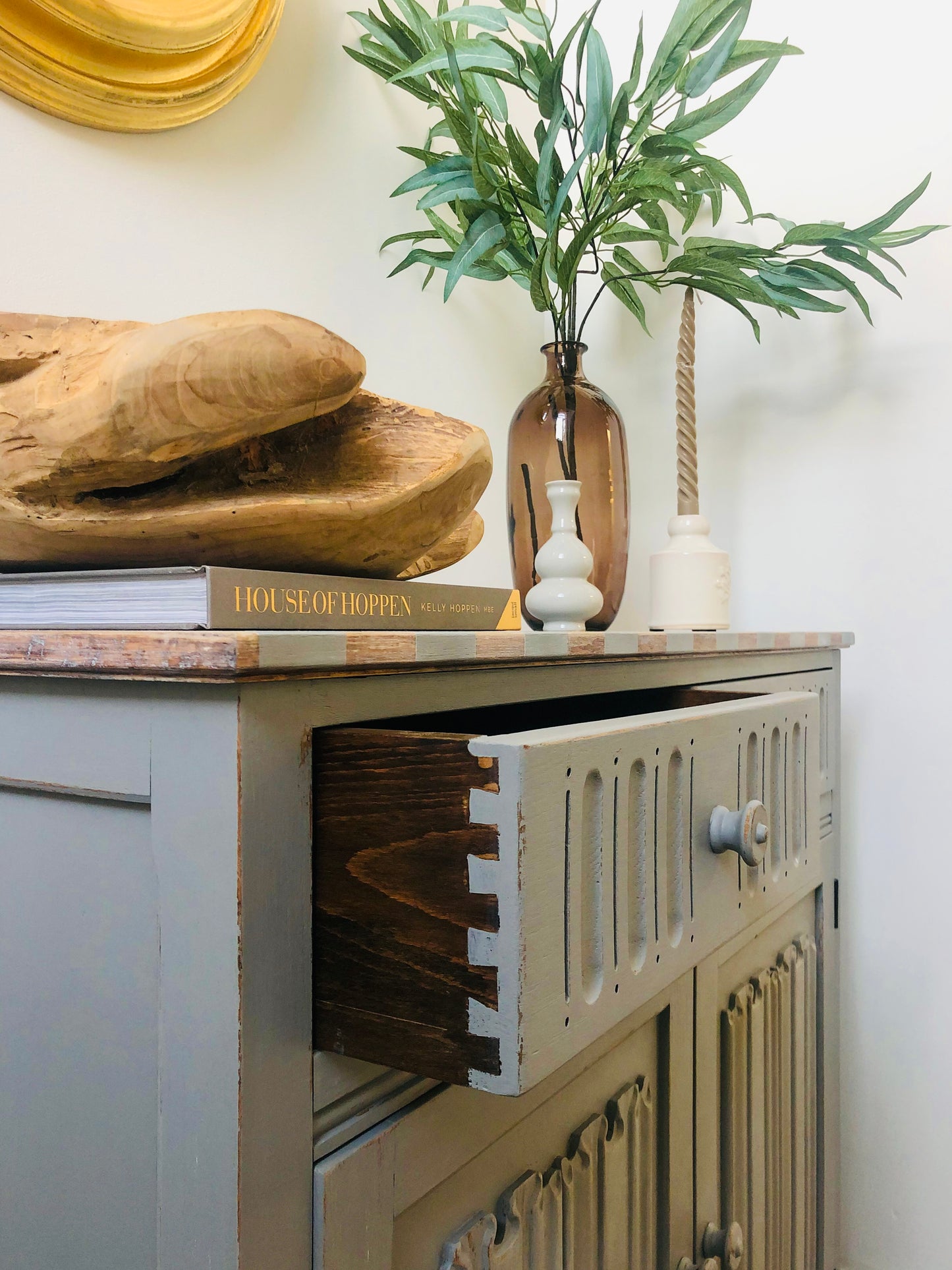 Grey painted vintage storage cabinet, with painted stripes