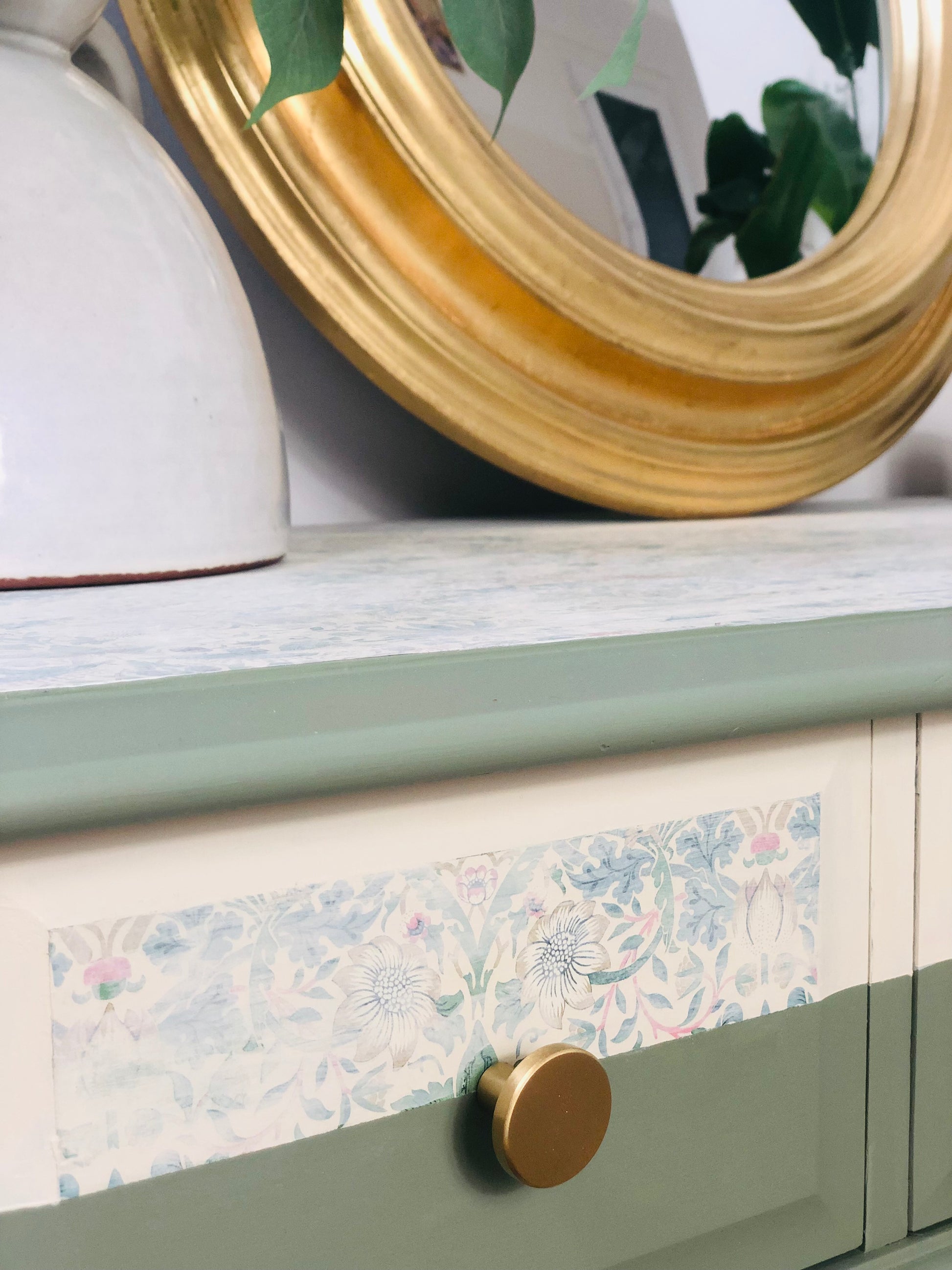 Stag Minstrel console table, painted in green with William Morris Strawberry theif paper detail and gold knobs